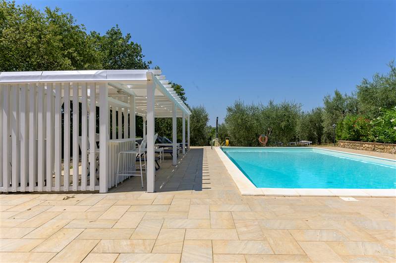Casale in pietra con piscina e vista panoramica sulla Maremma