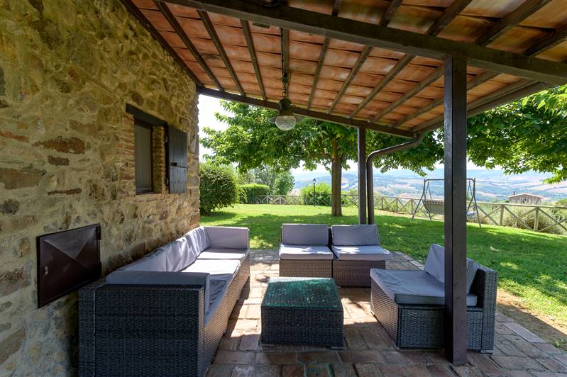 Casale in pietra con piscina e vista panoramica sulla Maremma