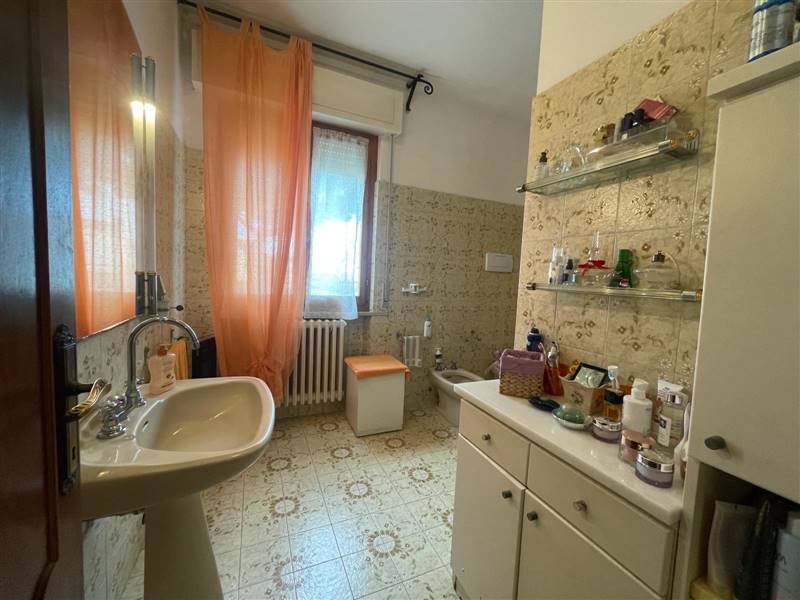 Appartamento  a pochi passi dal mare con giardino privato 