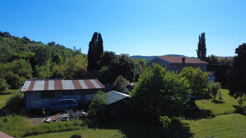 Stone farmhouse with olive grove for sale in Tuscany