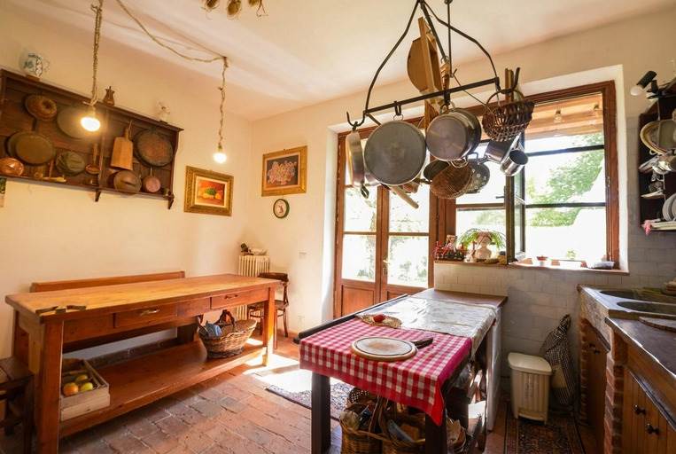 Stone farmhouse with olive grove for sale in Tuscany