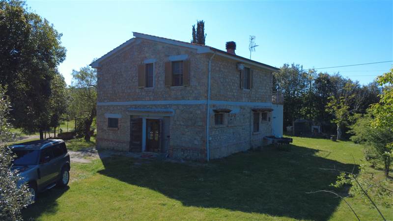Stone farmhouse with olive grove for sale in Tuscany